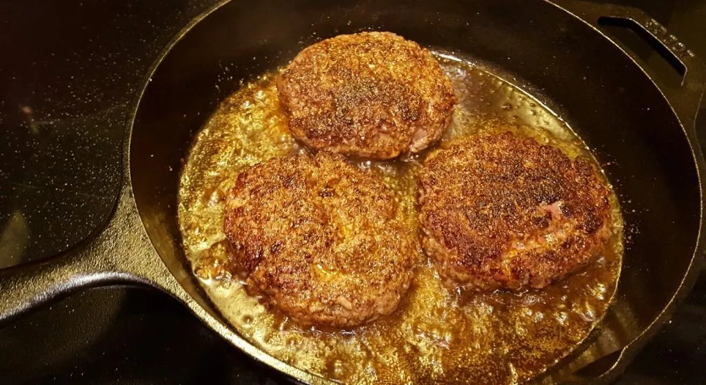 Hamburger Steaks in a Lodge Cast Iron Skillet