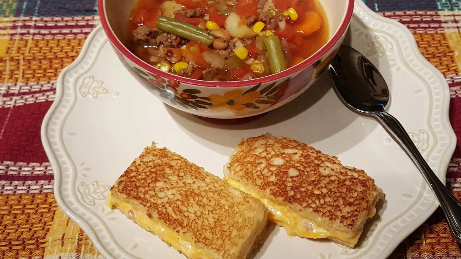 hamburger vegetable soup with a pimento cheese grilled cheese sandwich