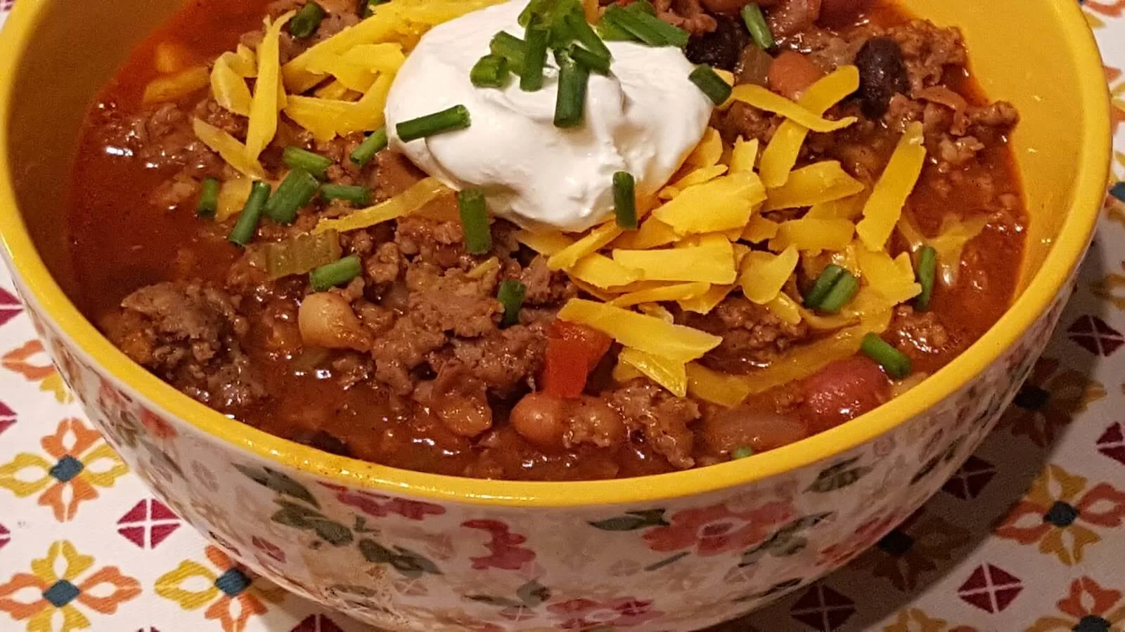 Chili Con Carne in a yellow bowl