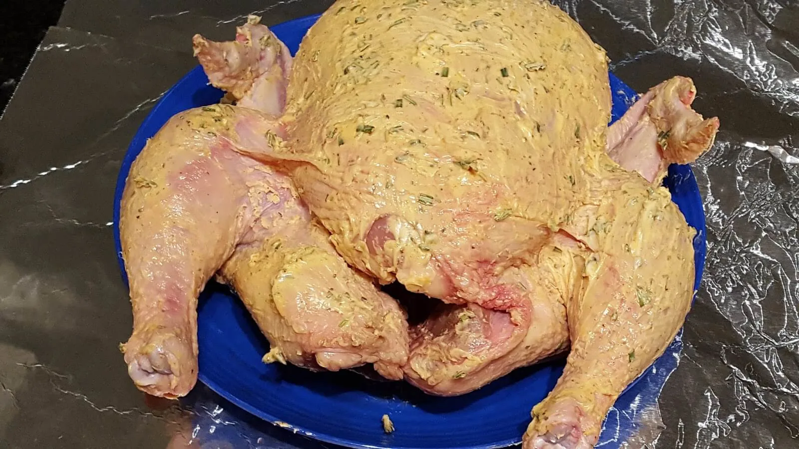 Preparing a chicken to roast
