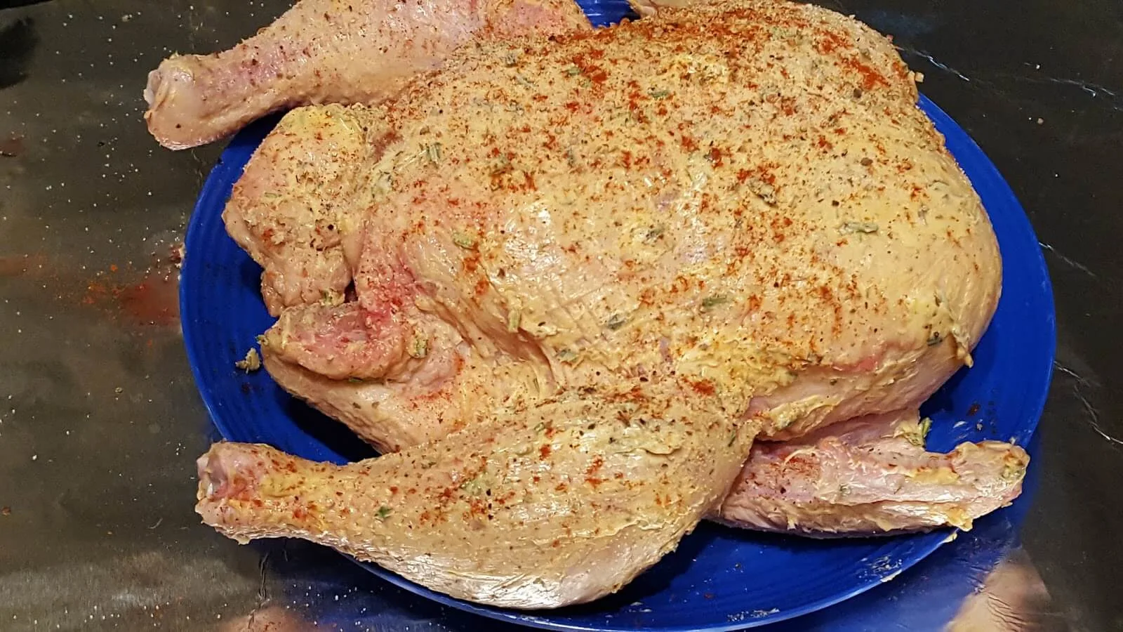 Seasoning a whole chicken to roast in the oven 