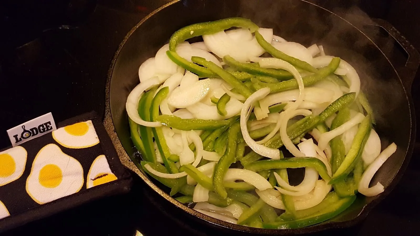 sautéing peppers and onion for cheesesteak wraps