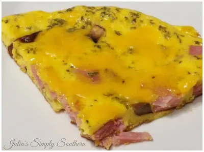 wedge slice of frittata with ham and mushrooms