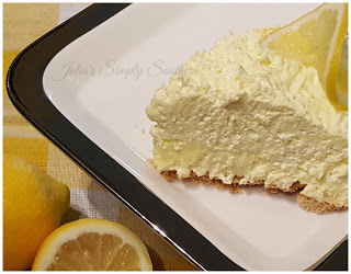 No Bake Lemon Pie slice on a serving dish garnished with a lemon slice