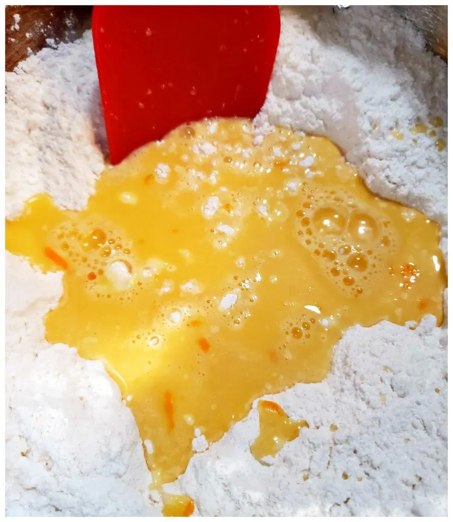 combining Orange mixture with flour mixture