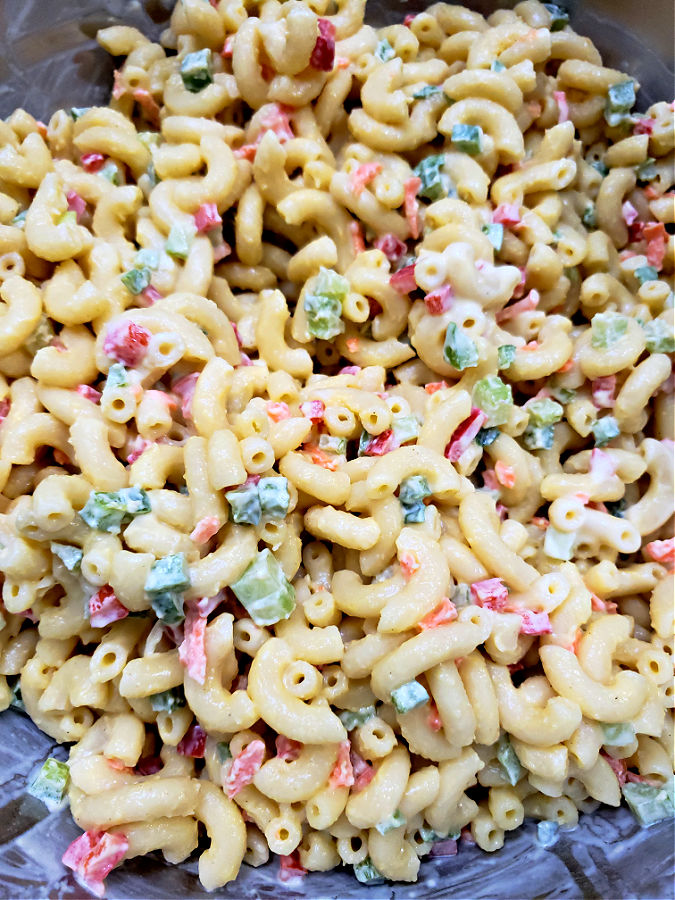 chilled macaroni salad that has absorbed the dressing