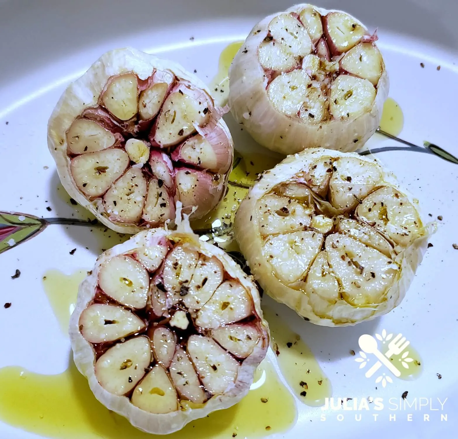 Season garlic bulbs with Kosher salt and cracked black pepper for roasting