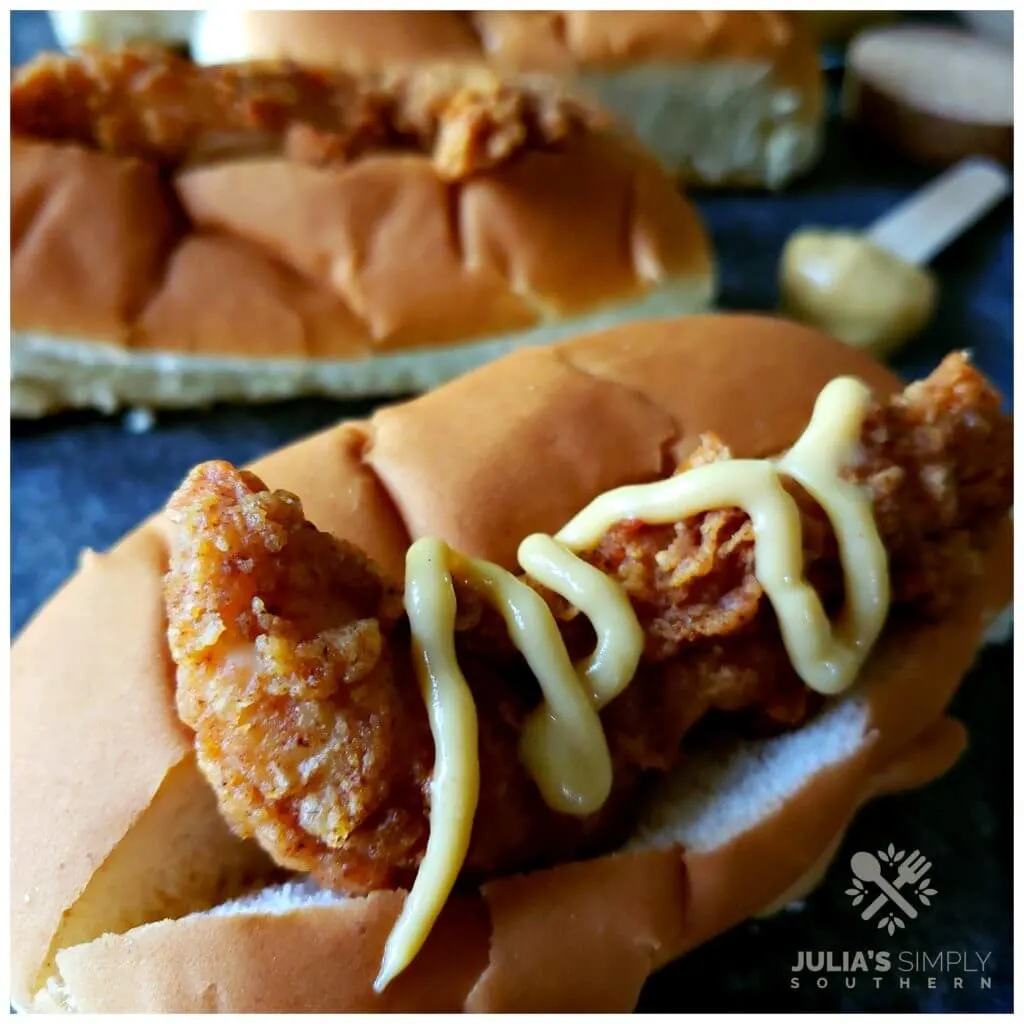 https://juliassimplysouthern.com/wp-content/uploads/Anderson-SC-Bird-Dog-Sandwich-Chicken-Hot-Dog-Bacon-Cheese-Honey-Mustard-Julias-Simply-Southern-1024x1024.jpg.webp