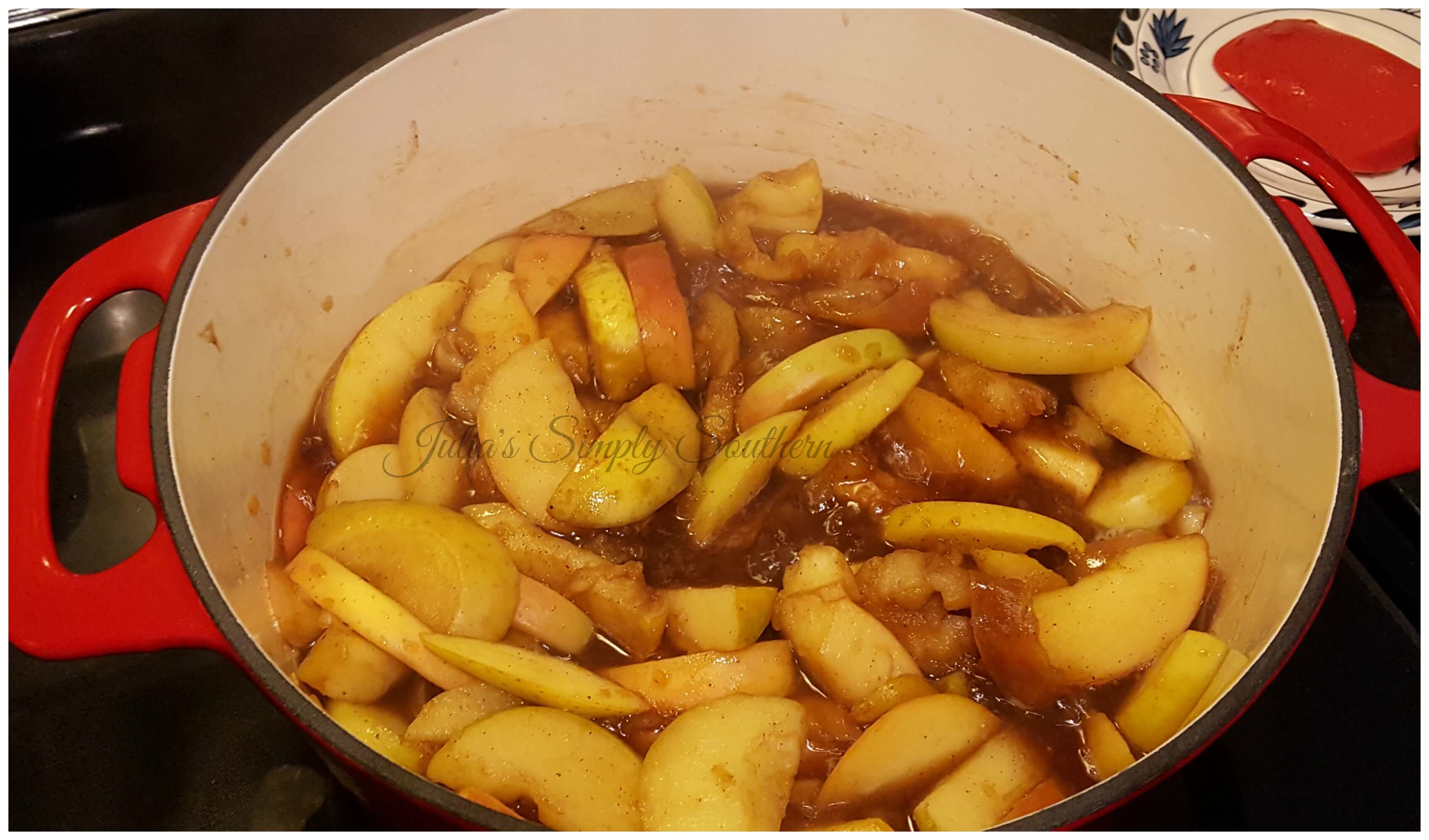 making homemade apple butter in a dutch oven