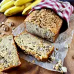 Banana Bread Recipe with self rising flour wrapped in a country towel