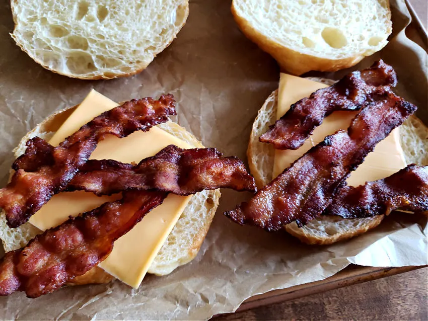 Bacon and cheese on breakfast sandwiches