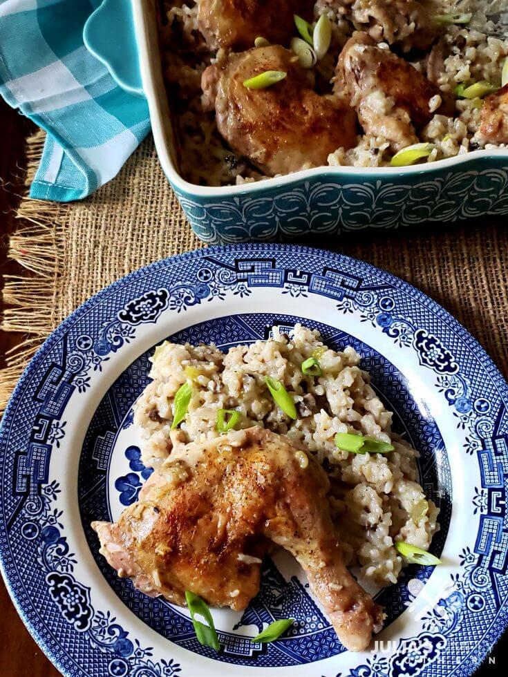 Blue and white plate with a serving of chicken and rice casserole that was oven baked