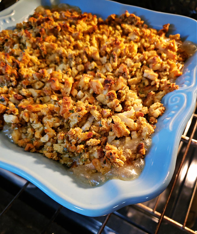 Canned Turkey Stuffing Casserole hot and bubbling in the oven