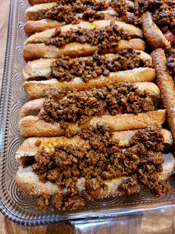 Hot dog casserole topped with Southern chili sauce and cheese