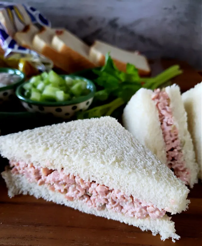 bologna salad sandwich on white bread with crust removed