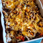 beef and cabbage casserole topped with cheese