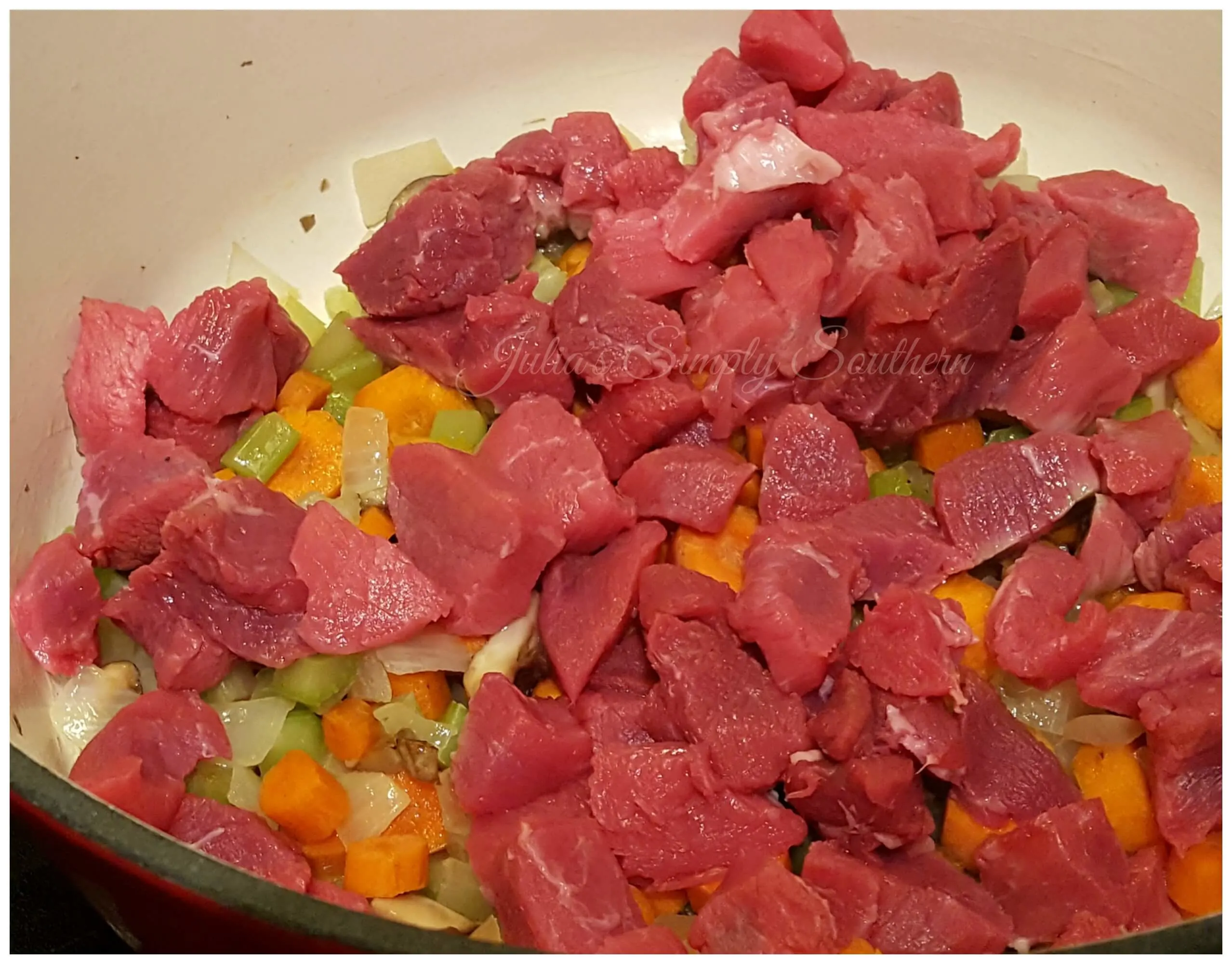 Making a pot of soup with beef