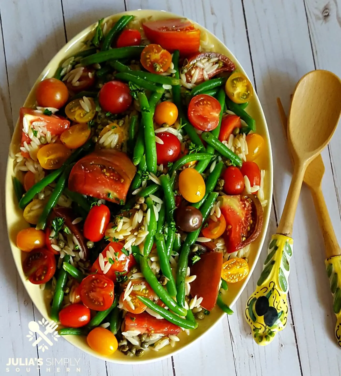 Colorful tomato and green bean salad side dish