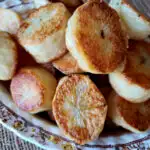 Best Roasted Potatoes Recipe made with duck fat in a vintage serving bowl