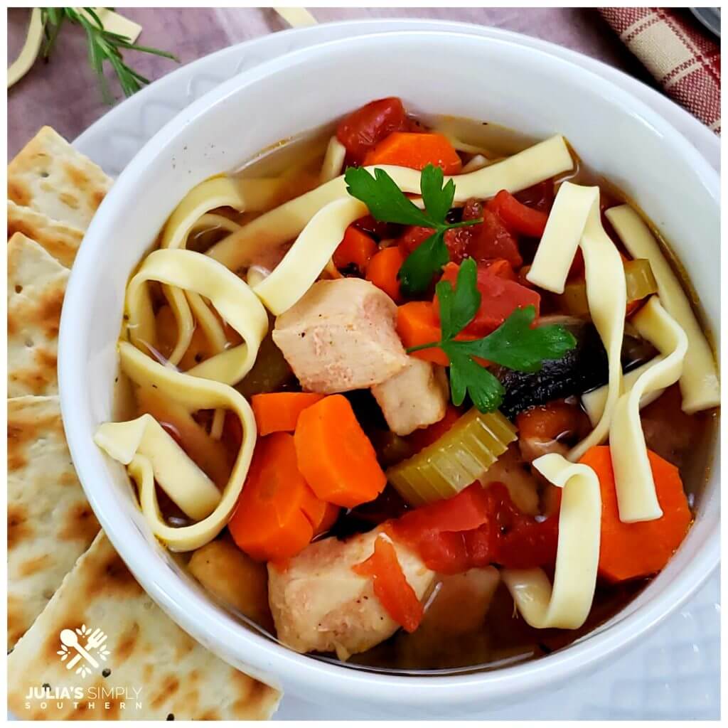 White bowl with slow cooker chicken soup - Best Southern food blog recipes
