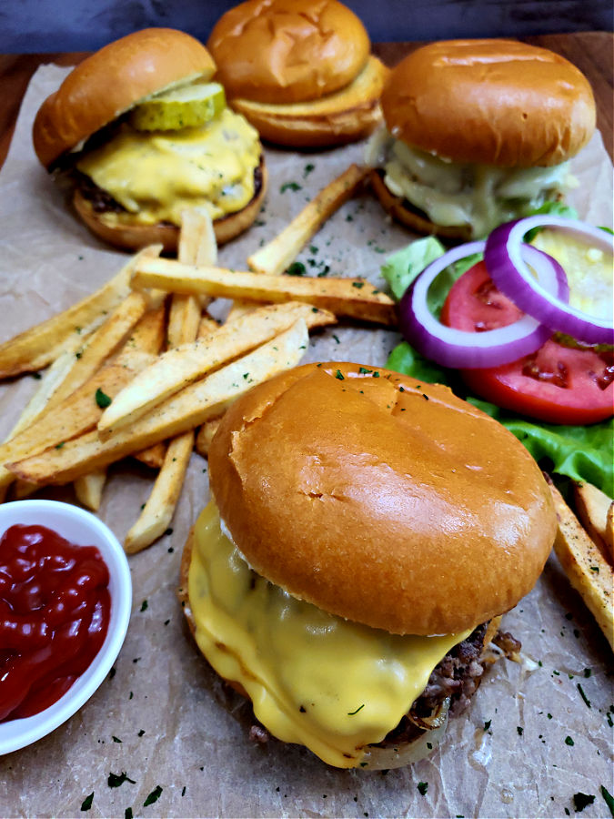 Tray with smash burgers and french fries