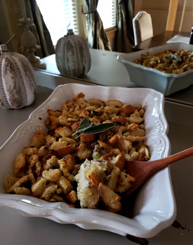 Thanksgiving stuffing with sausage on a server in a dining room