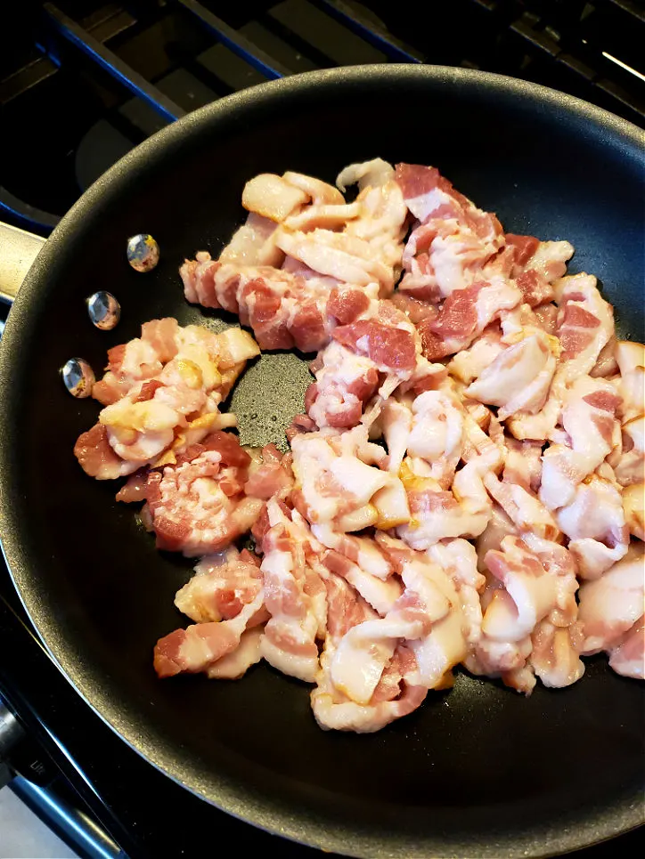 Frying a pound of bacon in a skillet