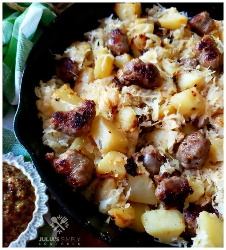 Bratwurst Potatoes and Sauerkraut Skillet Meal with a side of brown grain mustard