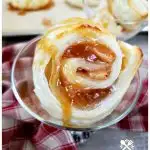 Easy and elegant apple pie puff pastry pinwheel dessert, served with vanilla ice cream and drizzled with caramel sauce. A delicious fall dessert recipe.