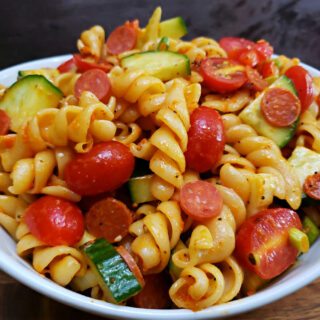 Fresh and Flavorful: The Ultimate Easy Pasta Salad Recipe in a white serving bowl