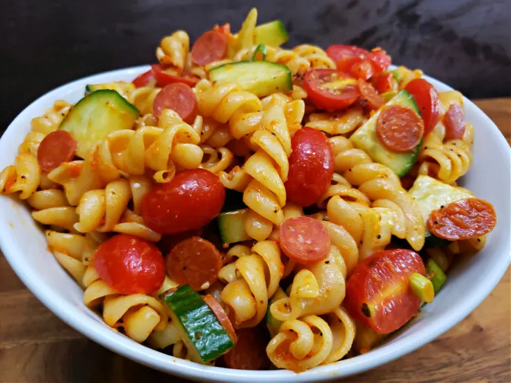 Fresh and Flavorful: The Ultimate Easy Pasta Salad Recipe in a white serving bowl