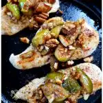 Amazing boneless chicken breast recipe topped with a honeyed fig and pecan topping, cooked in a cast iron skillet in under 15 minutes