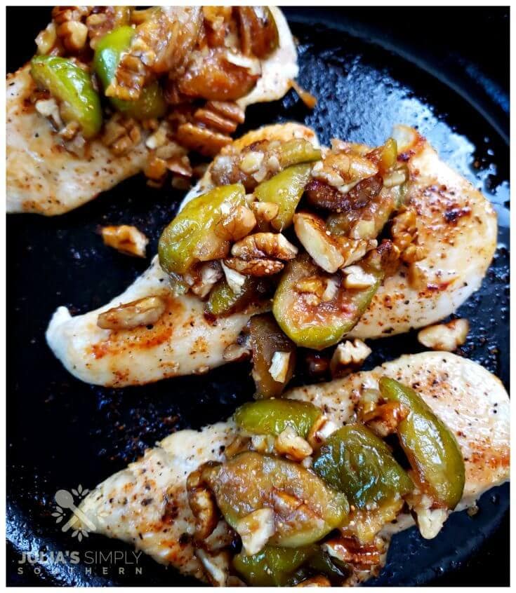 Amazing boneless chicken breast recipe topped with a honeyed fig and pecan topping, cooked in a cast iron skillet in under 15 minutes