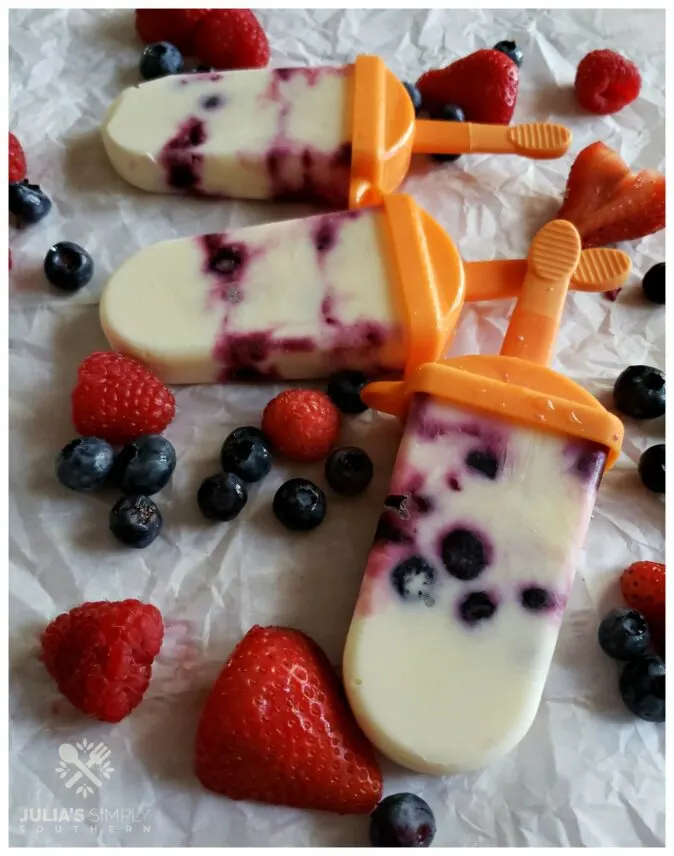 Yummy homemade popsicles recipe with berries and yogurt - low in sugar