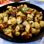Hot skillet with easy skillet breakfast potatoes with Greek Seasoning