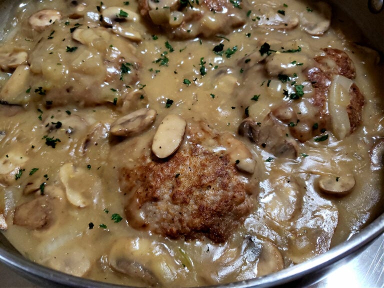 Southern Style Turkey Salisbury Steak with Gravy Recipe in a large stainless skillet