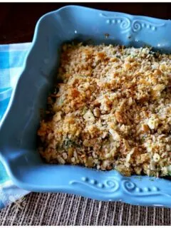 Classic Broccoli Casserole Recipe with Ritz Crackers in a square teal casserole dish