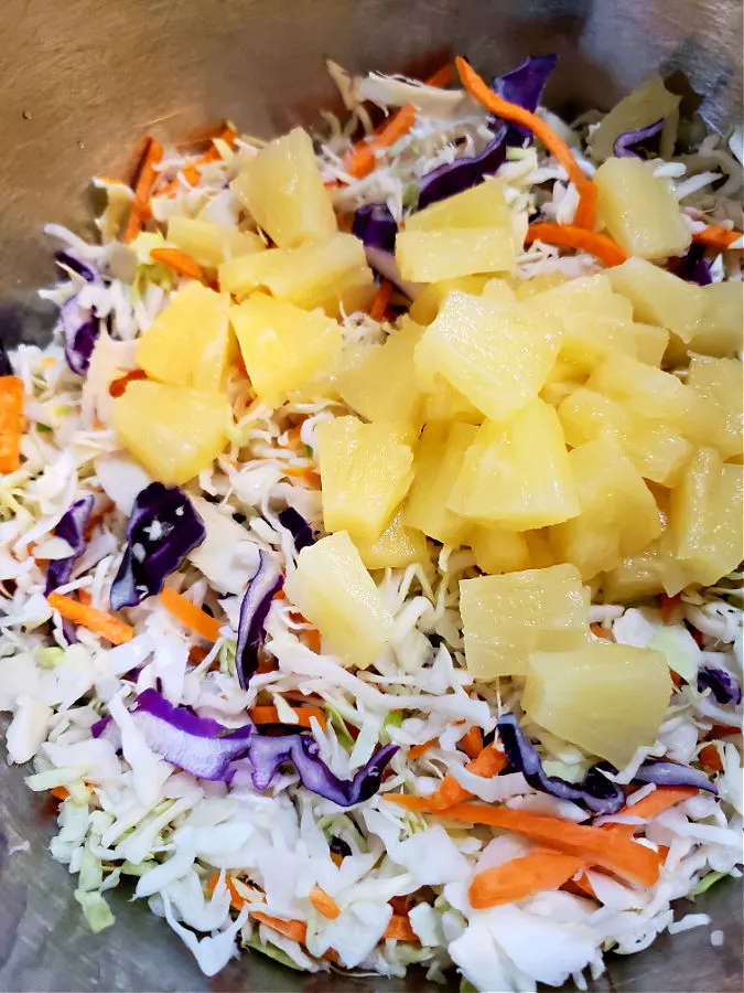 preparing a cabbage salad summer side dish