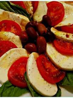 simple caprese salad with tomatoes mozzarella basil