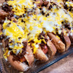 Oven baked hot dogs with Southern chili and cheese