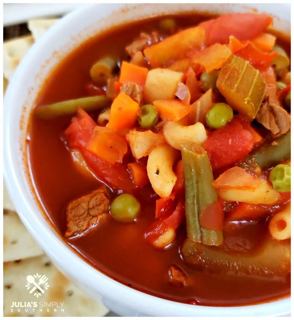 Rich tomato broth vegetable soup with beef and pasta