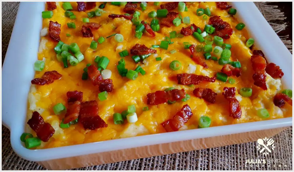 Delicious Loaded Mashed Potato Casserole recipe topped with bacon