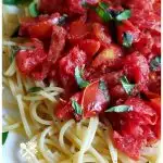 Fresh summer tomatoes with basil and pasta. This easy recipe cooks up quick for busy family dinners.