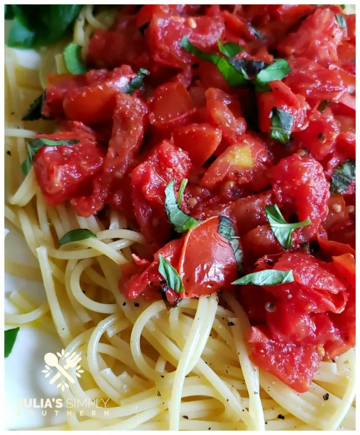 Fresh summer tomatoes with basil and pasta. This easy recipe cooks up quick for busy family dinners.