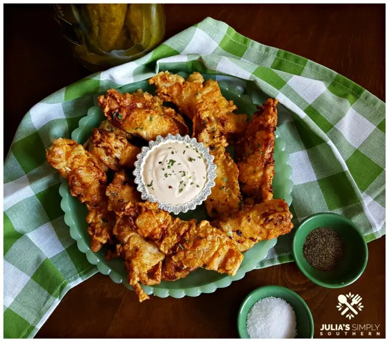 Dill Pickle Fried Chicken on a green jadeite glassware platter