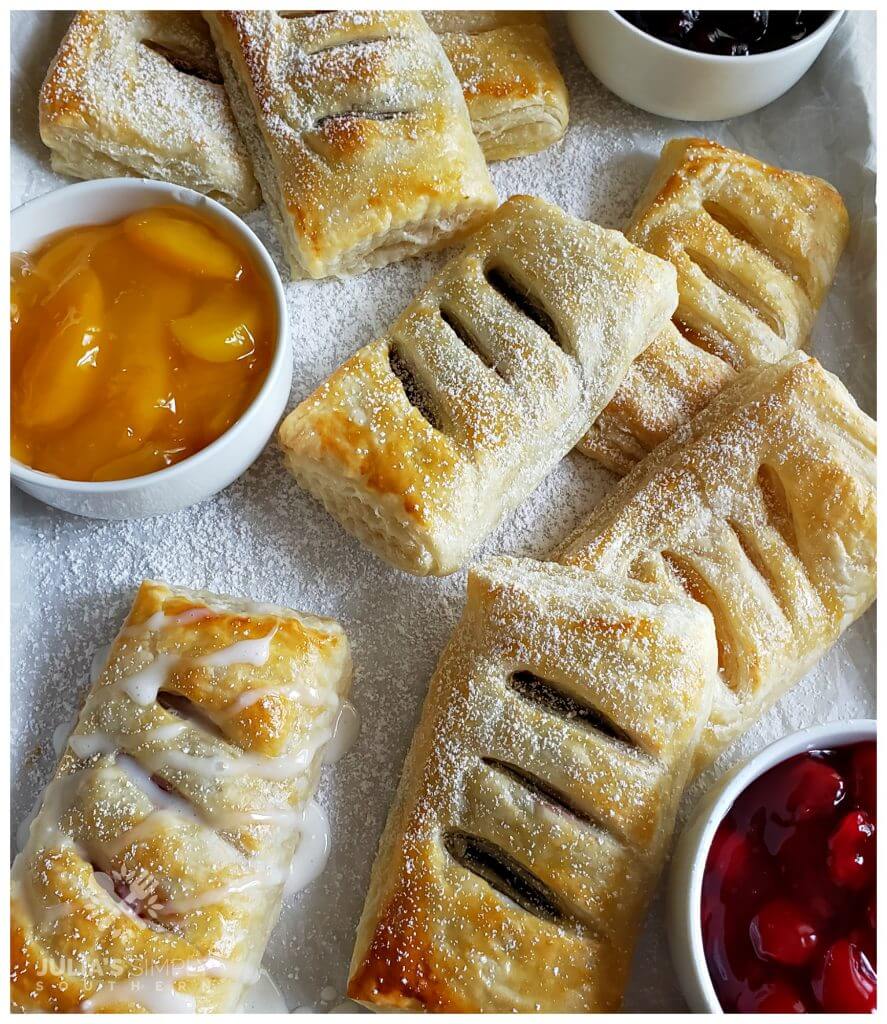 Easy 3 Ingredient fruit filled hand pies made with puff pastry and canned pie filling of your choice. Easy, delicious and kid friendly dessert.