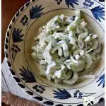 Quick and easy creamy cucumber salad with Vidalia onion and dill in a dressing of mayonnaise, sour cream and touch of buttermilk. It's tangy and delicious. The perfect cool side for summer.