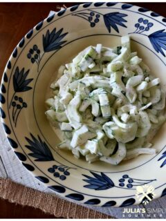 Quick and easy creamy cucumber salad with Vidalia onion and dill in a dressing of mayonnaise, sour cream and touch of buttermilk. It's tangy and delicious. The perfect cool side for summer.