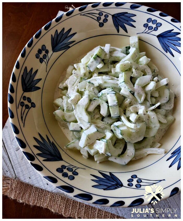 Quick and easy creamy cucumber salad with Vidalia onion and dill in a dressing of mayonnaise, sour cream and touch of buttermilk. It's tangy and delicious. The perfect cool side for summer.