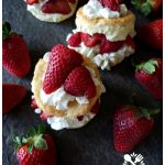 Traditional old fashioned strawberry shortcakes with fresh spring strawberries with whipped cream